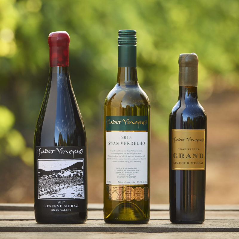 Premium wines with a vineyard backdrop